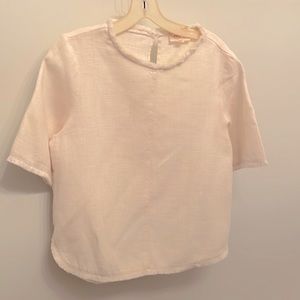 Egg-shell color top with fringe detail